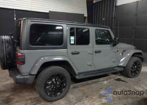 2022 Jeep Wrangler 4Xe Unlimited Sahara 4X4 z USA, uszkodzony, nr VIN 1C4JJXP66NW198723